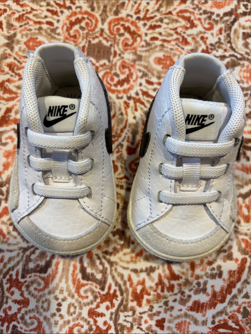 Nike White Baby Leather Sneakers with Black Swoosh